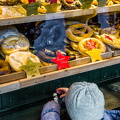 A mini visitor at the cake stall (1438 visits) Food stall at the Salzburg Domplatz Christkindlmarkt A mini visitor at the cake stall
